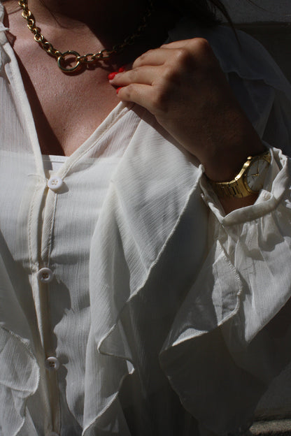 Chaîne dorée à pendentif